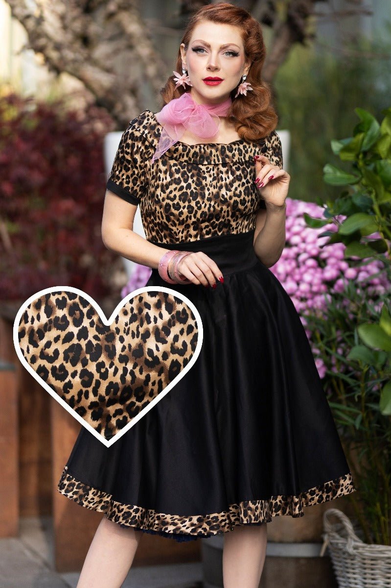 http://www.dollyanddotty.co.uk/cdn/shop/products/woman_s_swing_dress_in_leopard_print_3-480257.jpg?v=1677659666