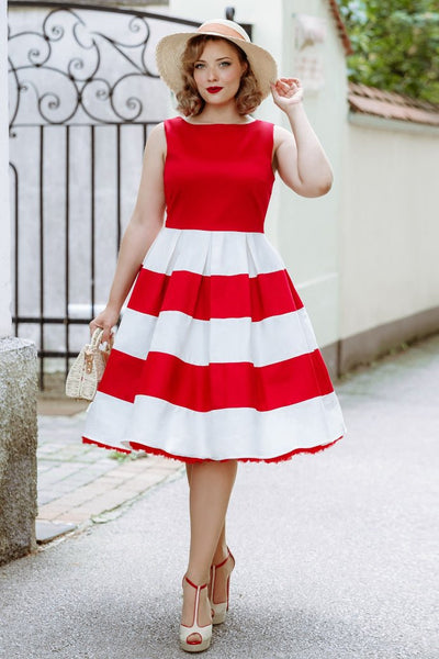 A model wearing a 50's Red/White Striped Swing Dress