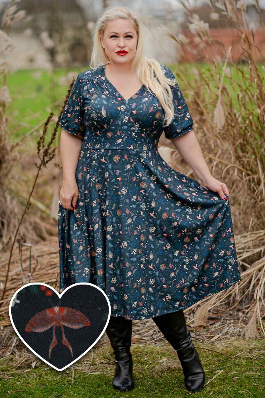 A model wearing a 50s Style Mystical Forest Dress