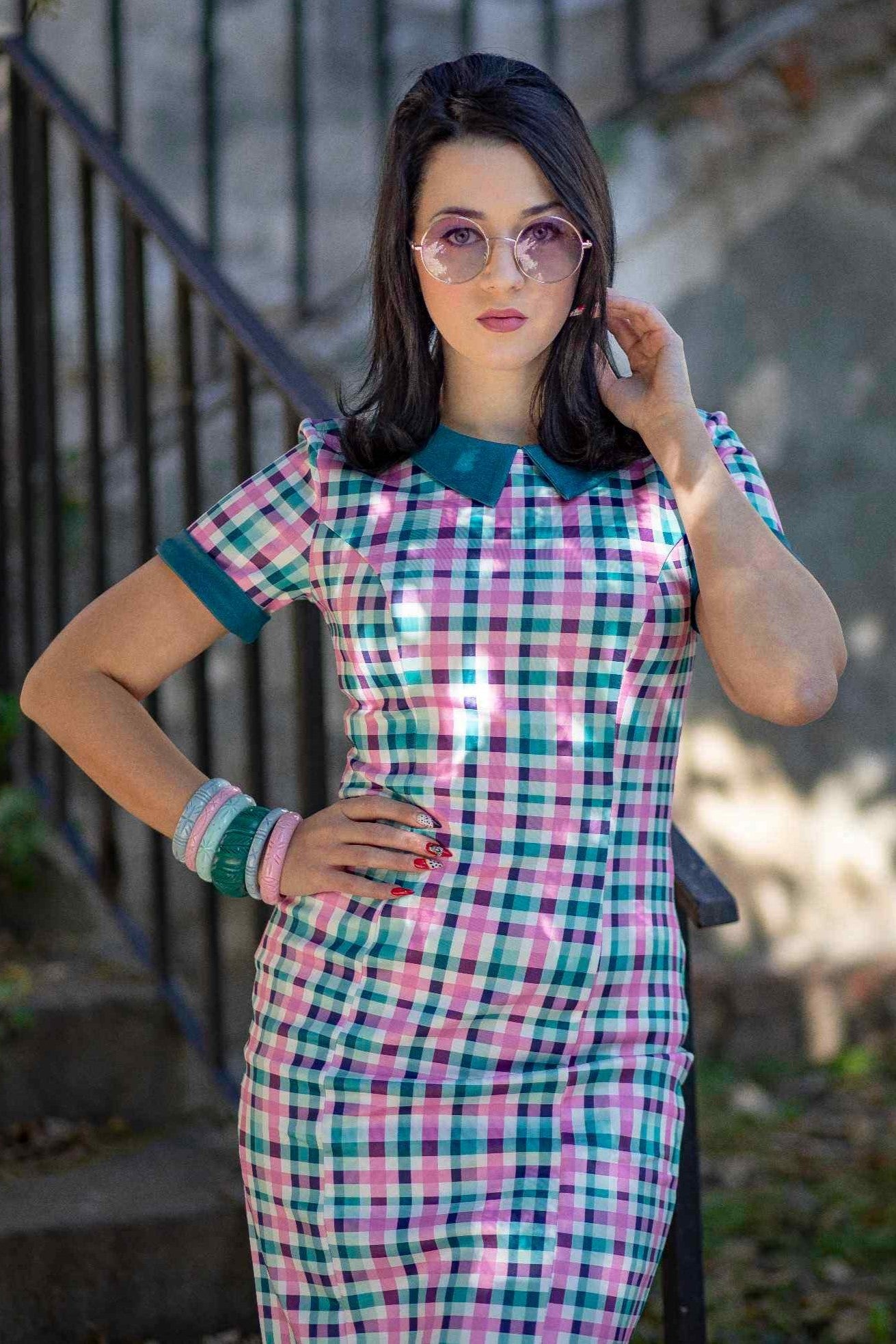 A lady wearing a 50s Style Pink & Green Check Collar Dress