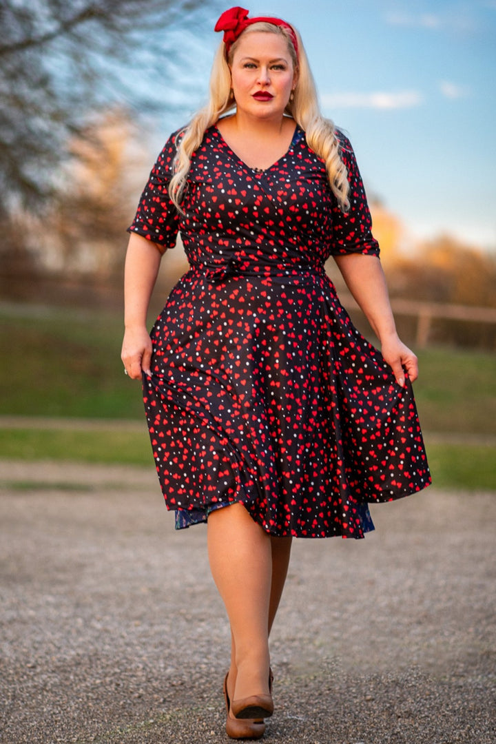 Black dress with red hearts on sale