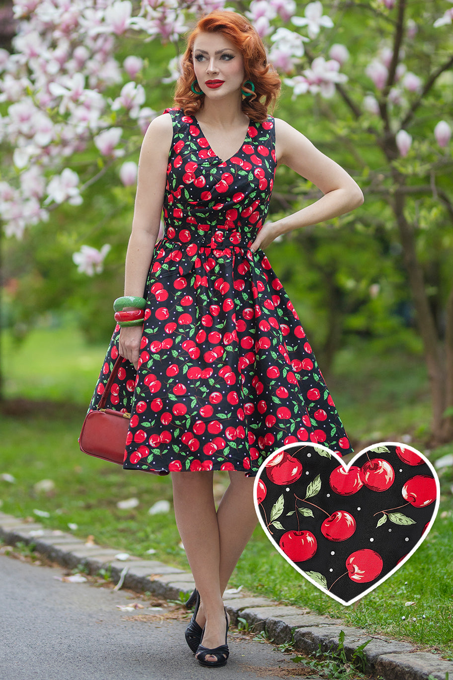 A model wearing a Crossover Bust Cherry Swing Dress