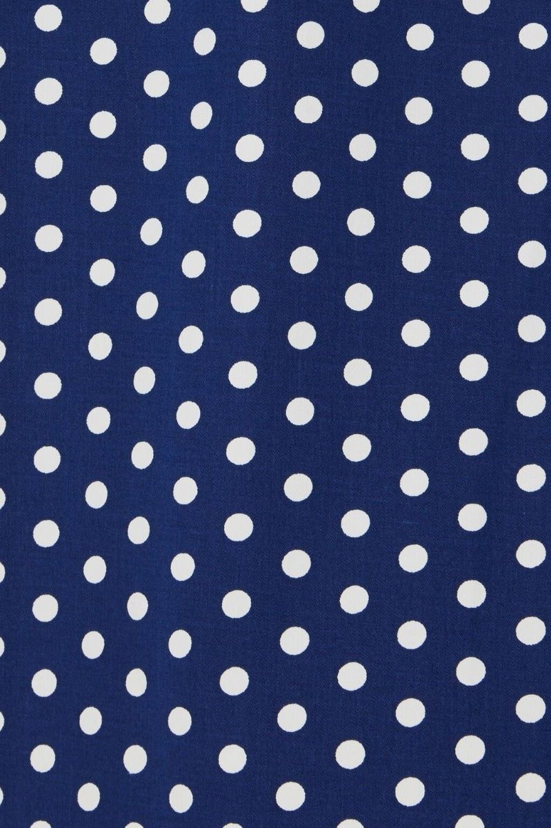 dark blue fabric, with white polka dots