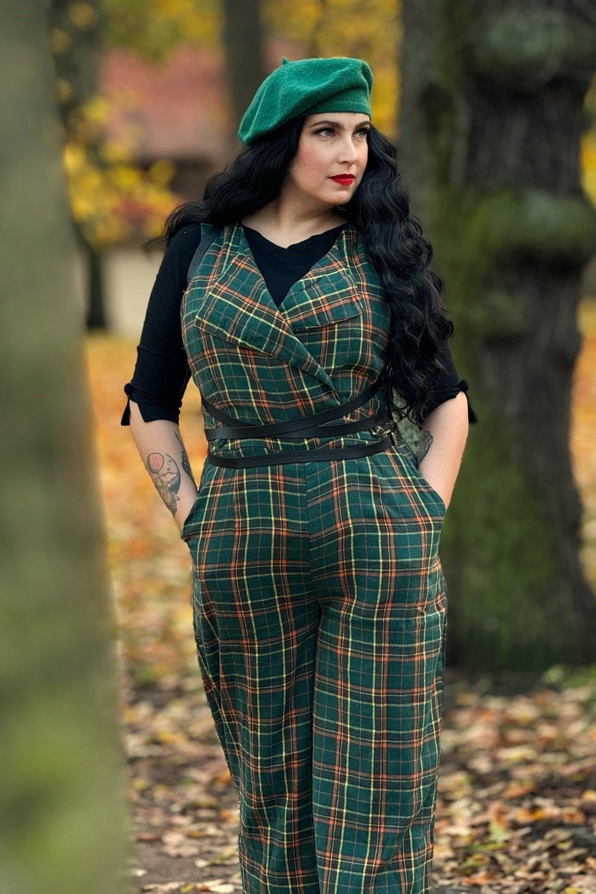 A model wearing a Green Tartan Jumpsuit