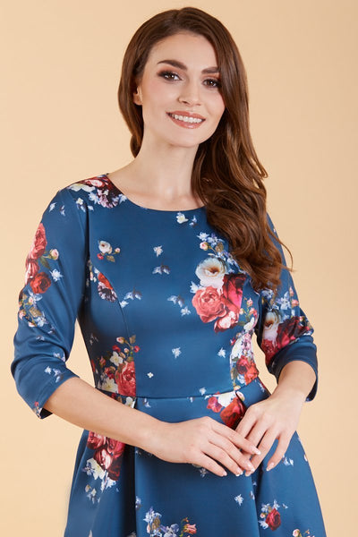 Close up view of Long Sleeved Navy & Red Floral Midi Dress