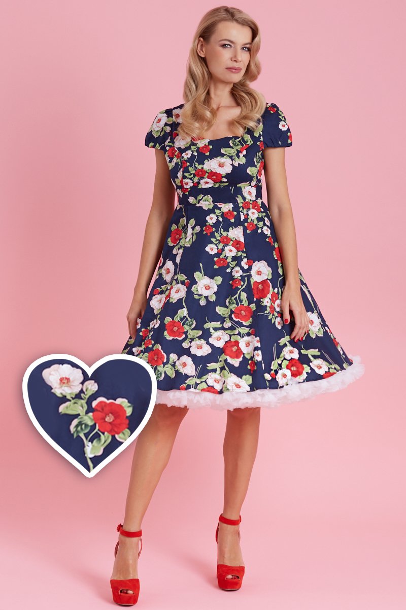 A model wearing Navy & White Red Floral Swing Dress