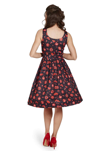 Model wearing Pin Up Lip & Cherry Swing Dress