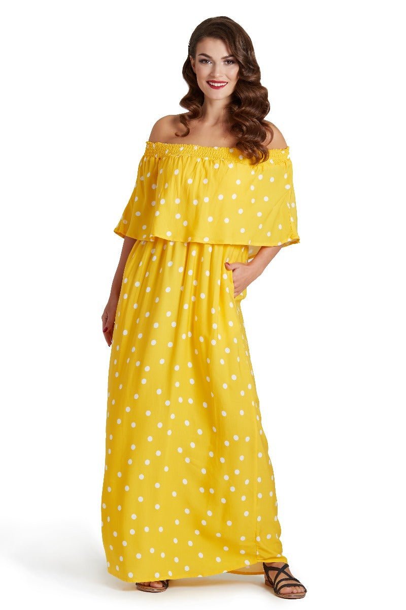 A model wearing Two-Way Off-Shoulder Maxi Dress in Polka Dot Print