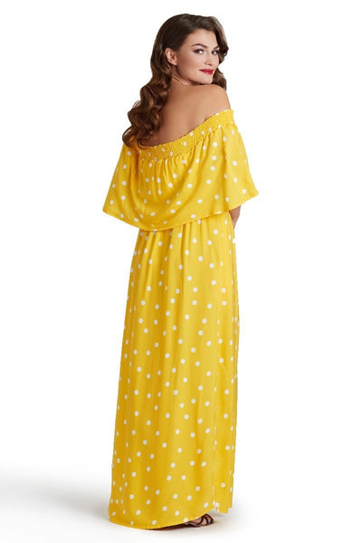 A model wearing Two-Way Off-Shoulder Maxi Dress in Polka Dot Print