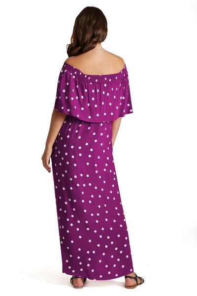 A model wearing Two-Way Off-Shoulder Maxi Dress in Polka Dot Print