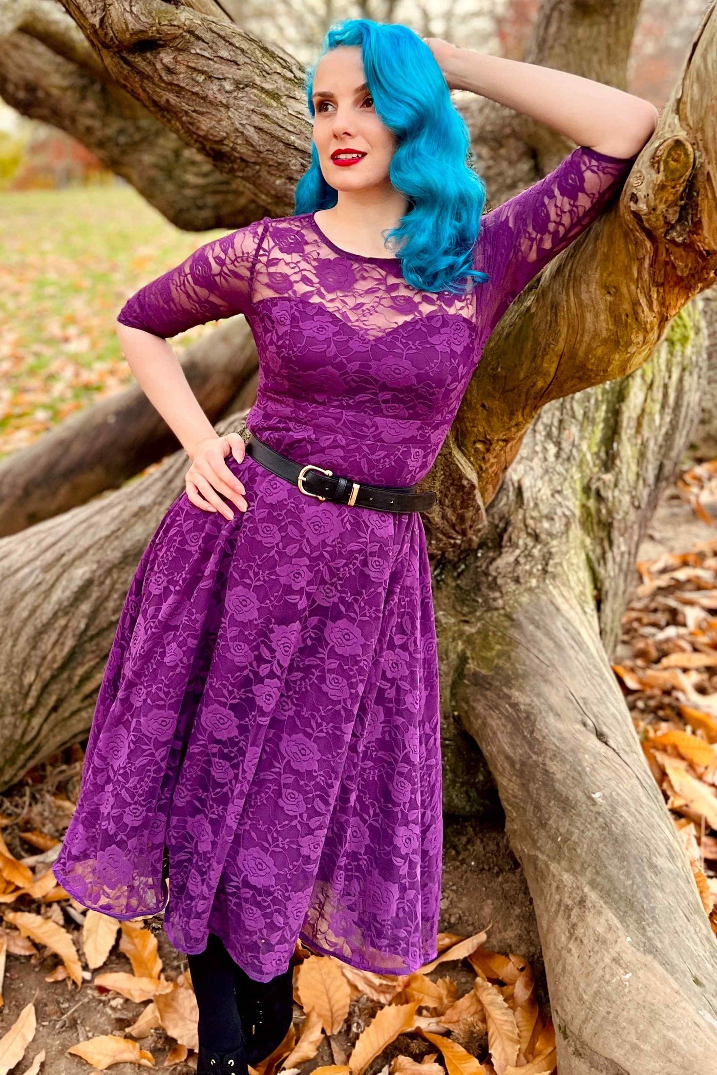 Model photo of Long Sleeved Purple Lace Dress