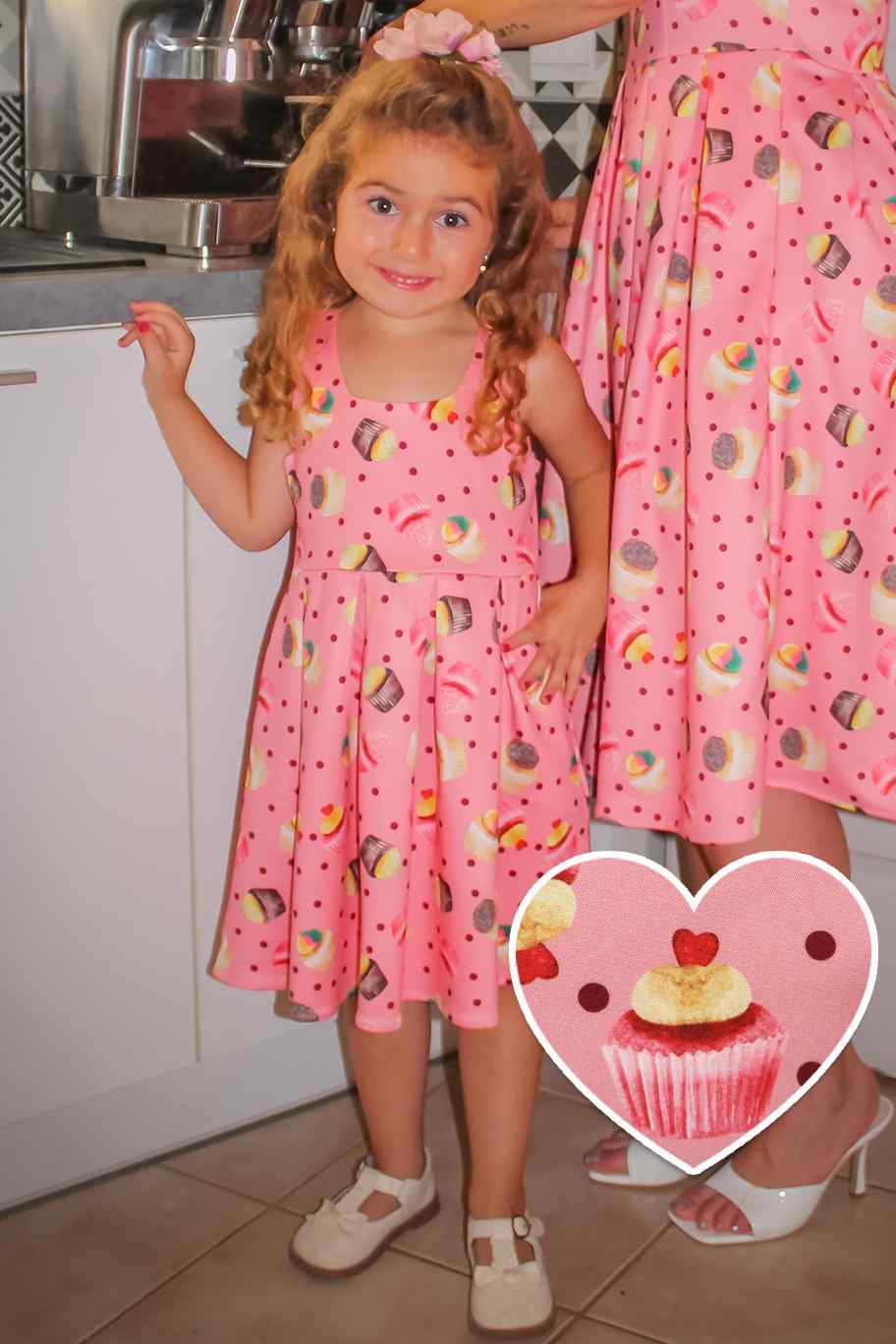 A model wearing amanda-pink-cupcake-swing-dress