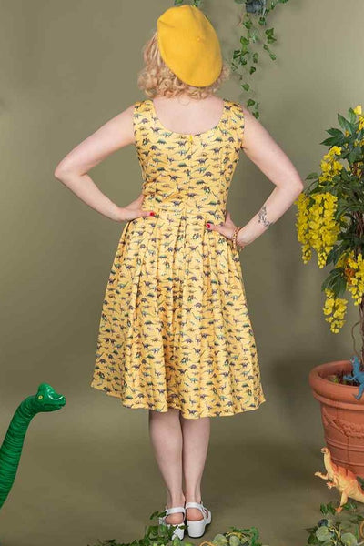 A model wearing a Yellow Antique Dinosaur Flared Dress