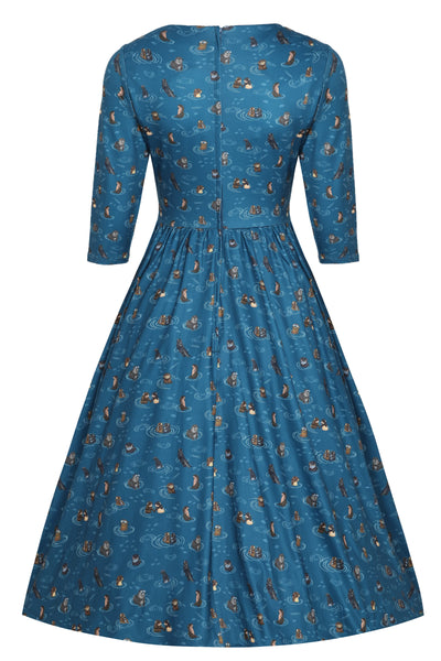 billie long sleeved blue otter family dress behind angle