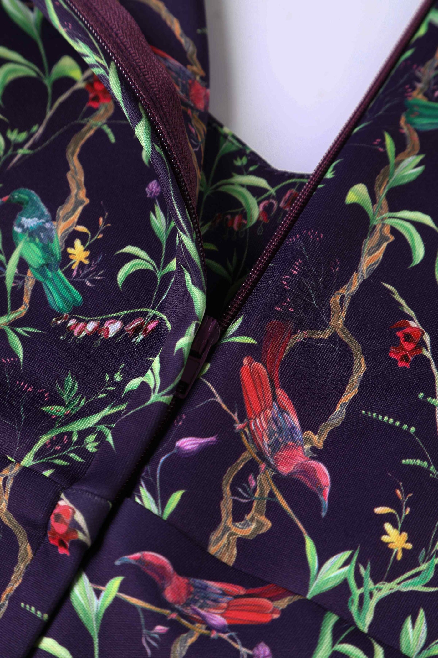 Close up view of Bird & Floral Midi Dress On Purple