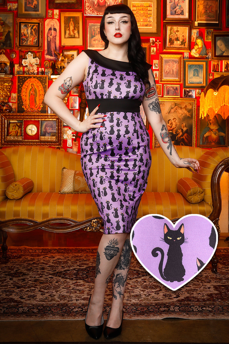 A lady wearing a Black Cat Roll Collar Wiggle Dress In Purple