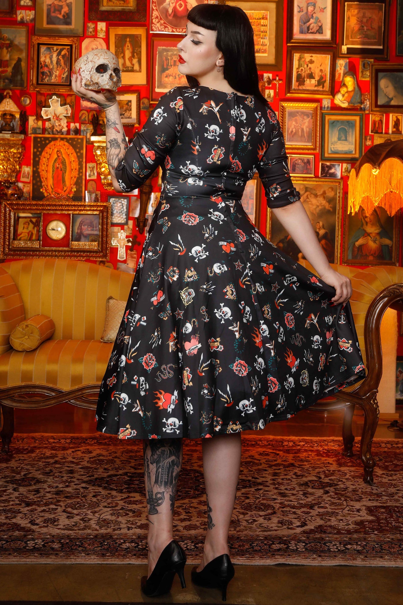 A model wearing a Black Old School Tattoo Midi Dress