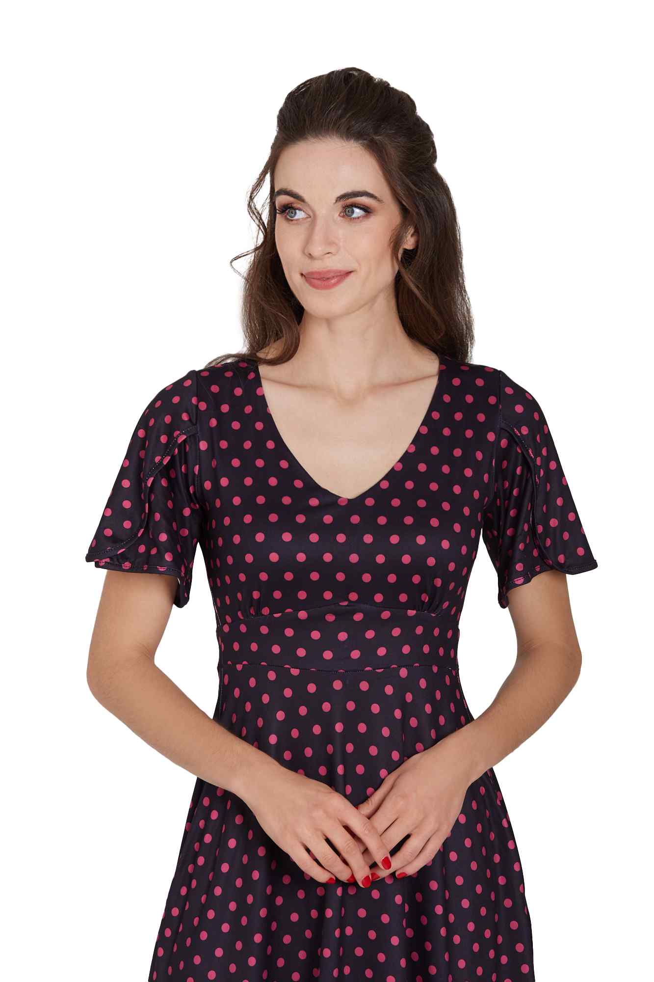 Model wearing Sleeved Flared Tea Dress in Black Polka Dot Print