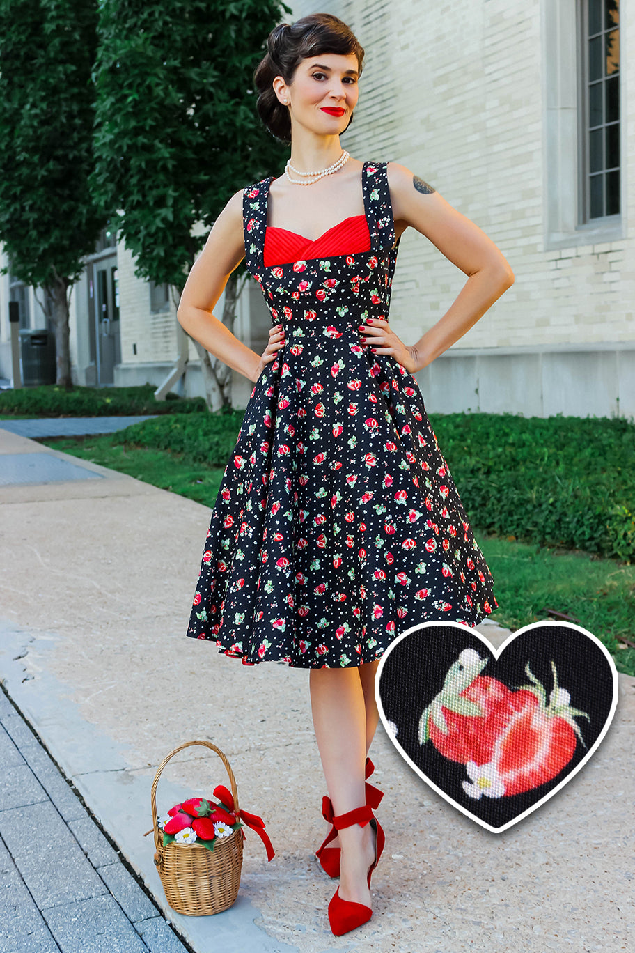 A model wearing a Black Strawberry Pleated Bust Dress