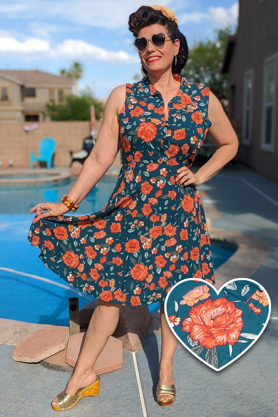 A lady wearing a Blue & Orange Floral Collar Dress