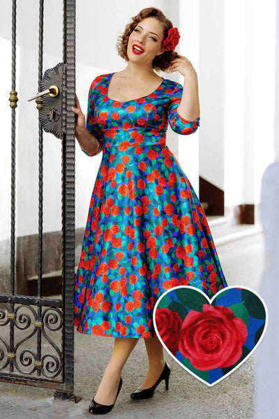 A model wearing a Blue & Red Rose Dress