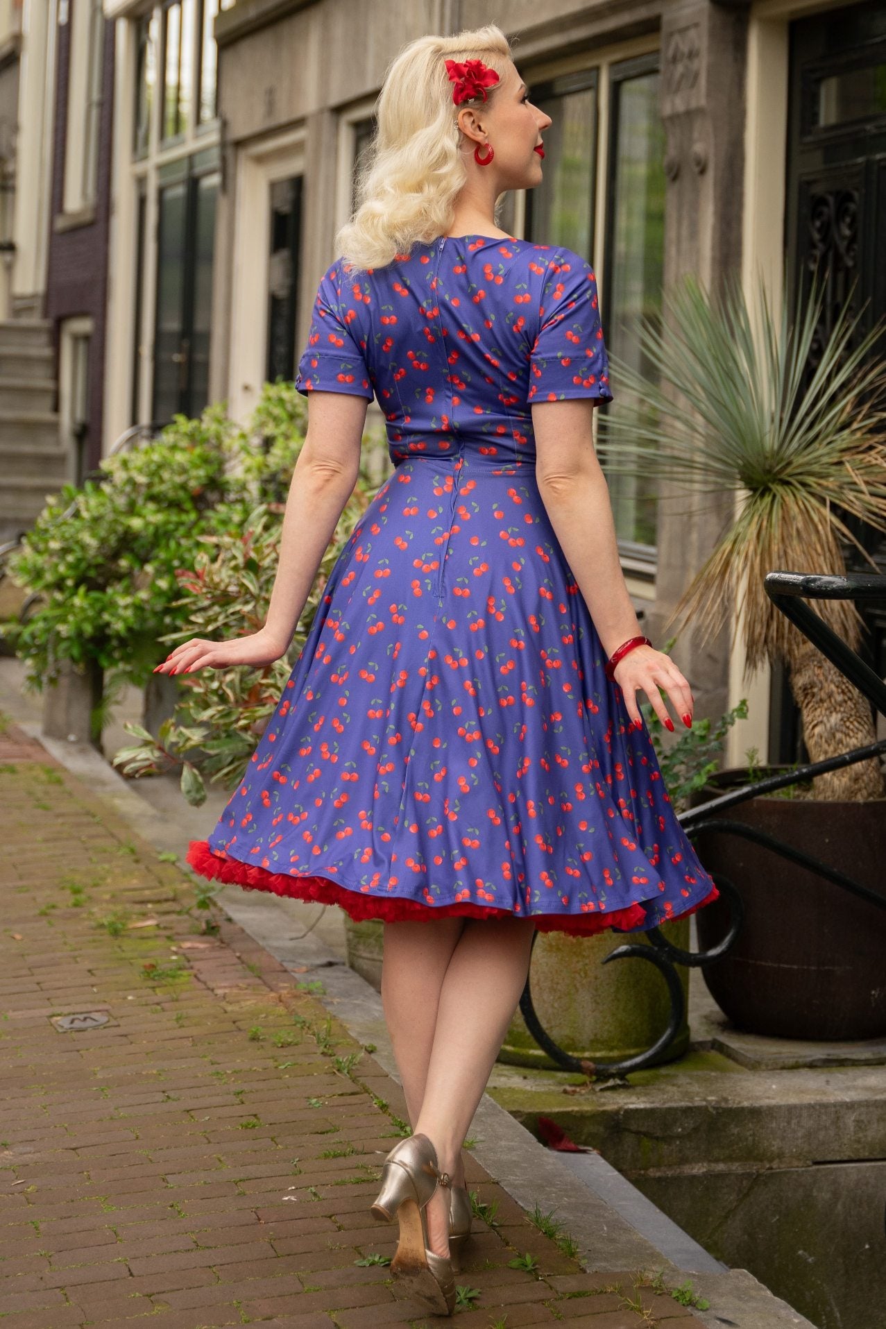 A model wearing a Blue Cherry Flared Dress