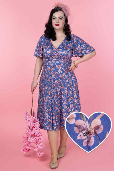 A model wearing a Blue Orchid Tea Dress