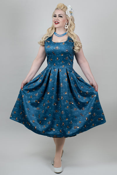 A model wearing a Blue Otter Family Tea Dress