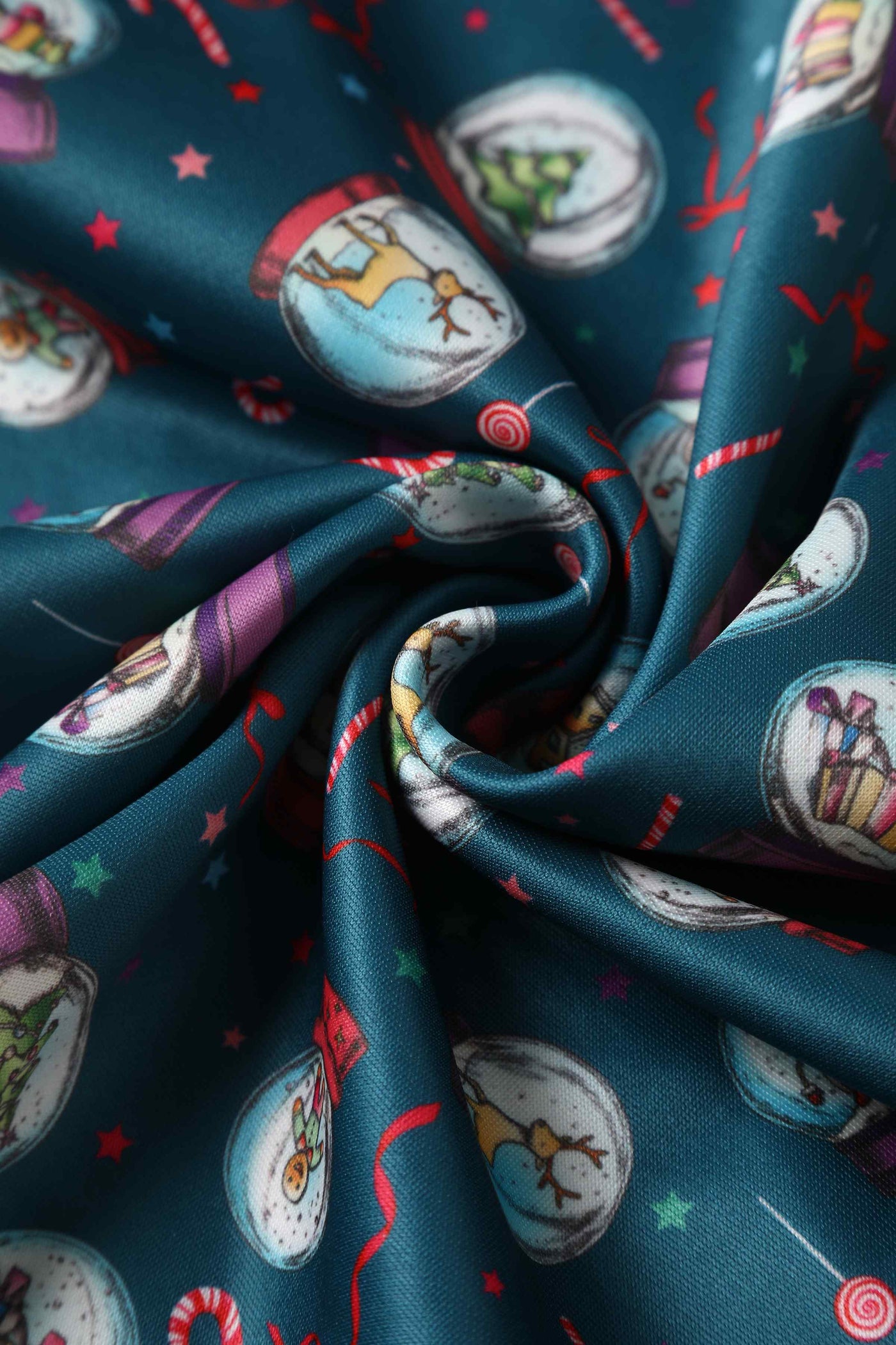 Close up view of Blue Snow Globe Long Sleeved Dress