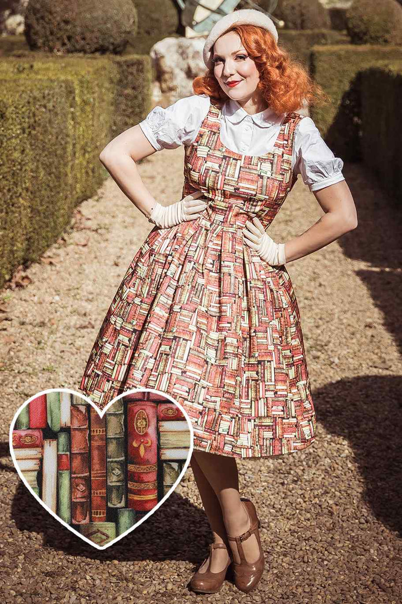 A model wearing  Book Print Tea Dress