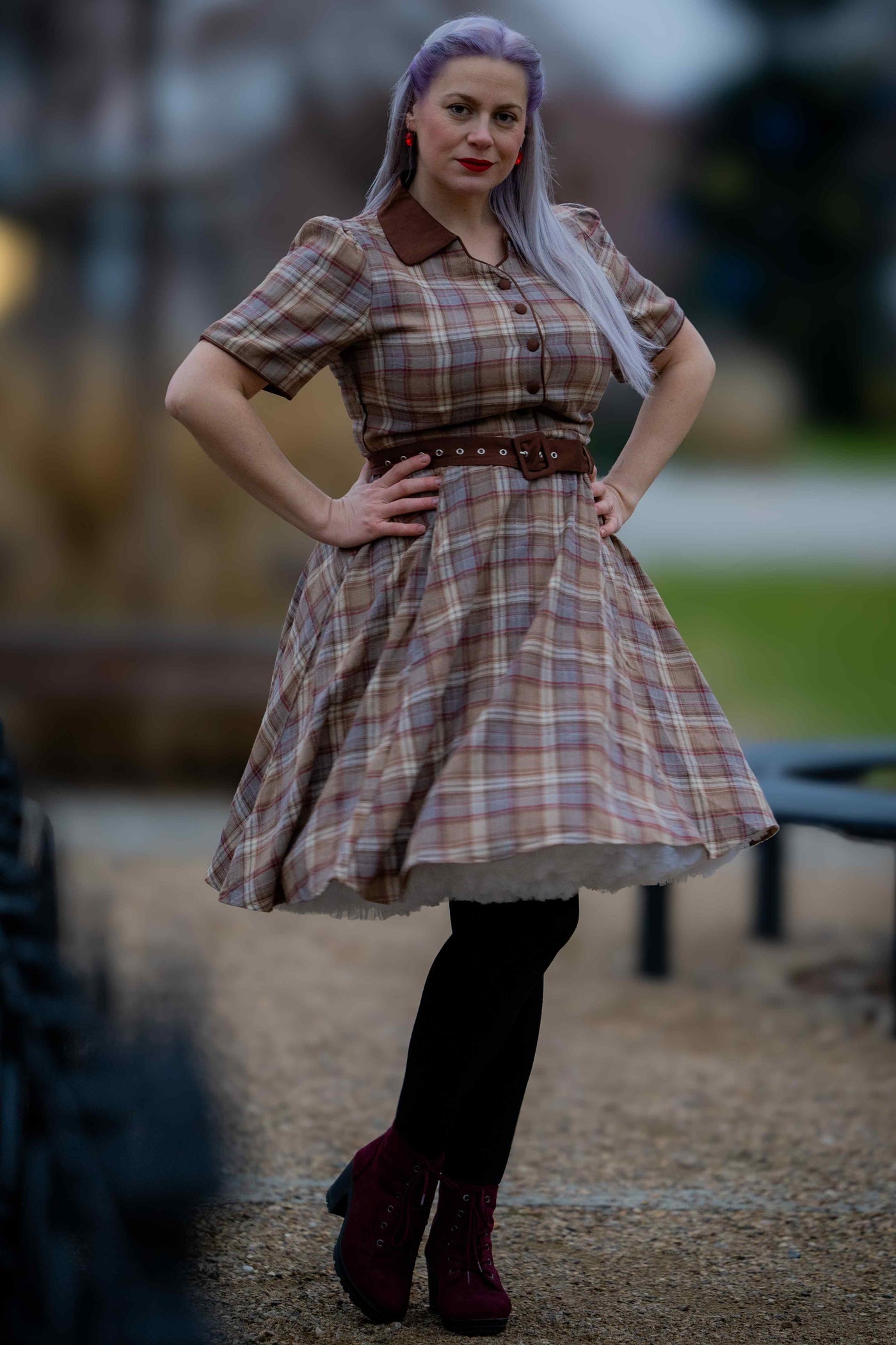 A model wearing a Brown Tartan Shirt Dress