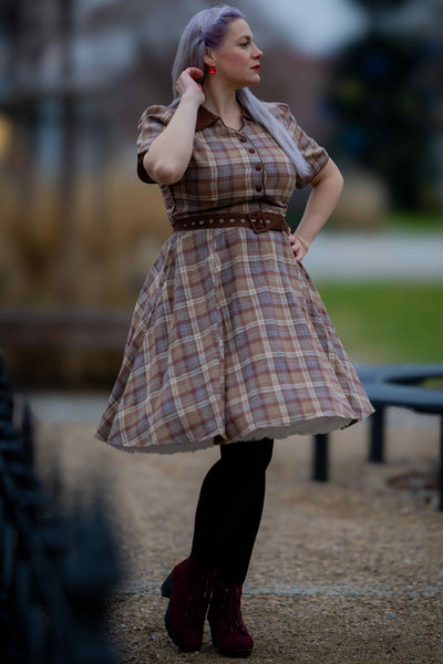 A model wearing a Brown Tartan Shirt Dress