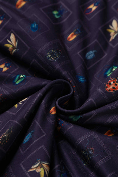 Close up View of Bug Collection Print Wrap Around Dress In Nave Blue