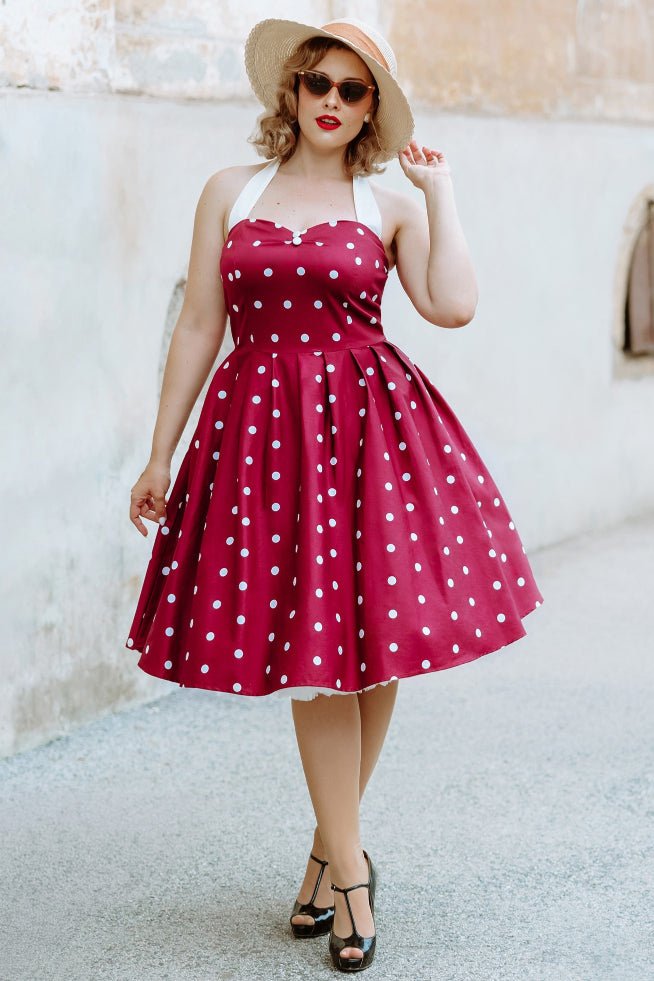 A model wearing a Burgundy & White Halterneck Dress