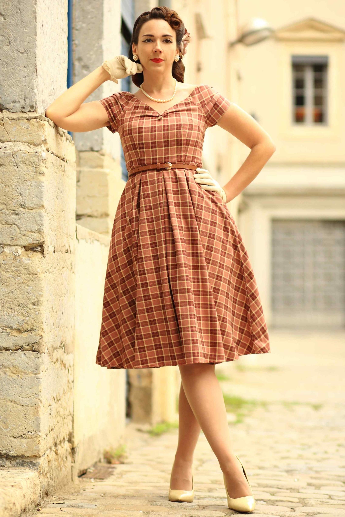 A model wearing Burgundy Tartan Off Shoulder Swing Dress