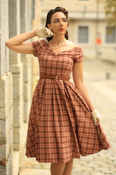 A model wearing Burgundy Tartan Off Shoulder Swing Dress