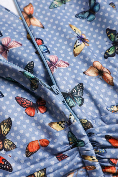 Close up view of Butterfly Polka Dot Tea Dress in blue