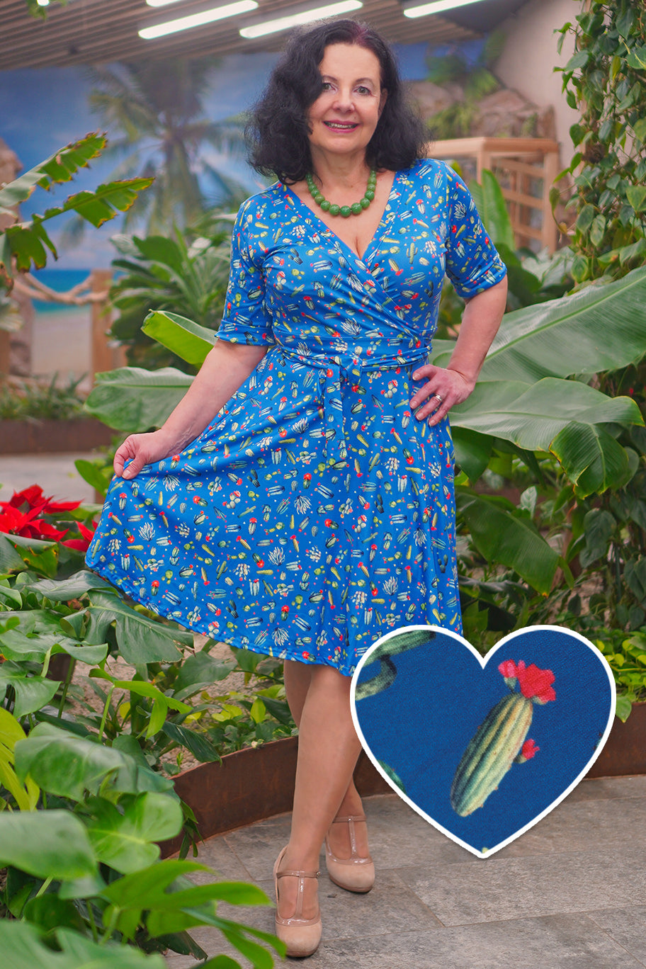 A model wearing a Cactus Blue Wrap Dress