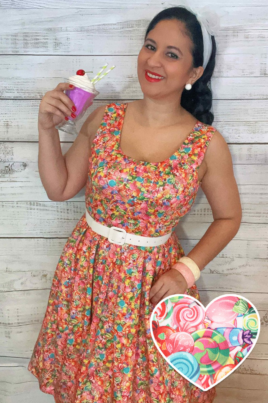 A lady wearing a Candyland Swing Dress