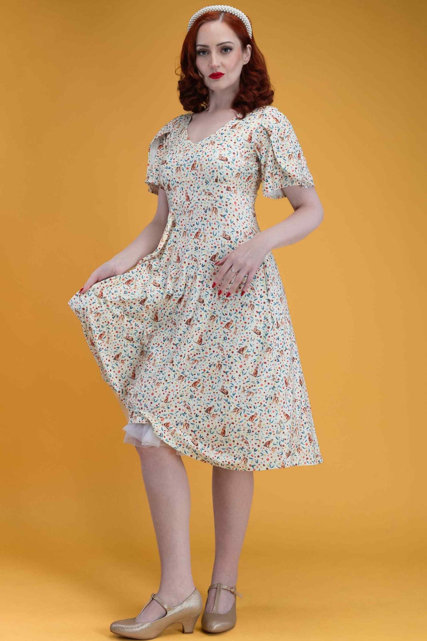 Ivory Cream Sleeved Tea Dress in Cat Floral Print