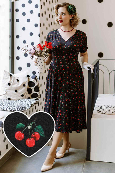 Model photo front view of Cherry Print Tea Dress in Black