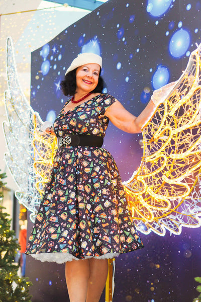 A model wearing Christmas Fair Off Shoulder Dress