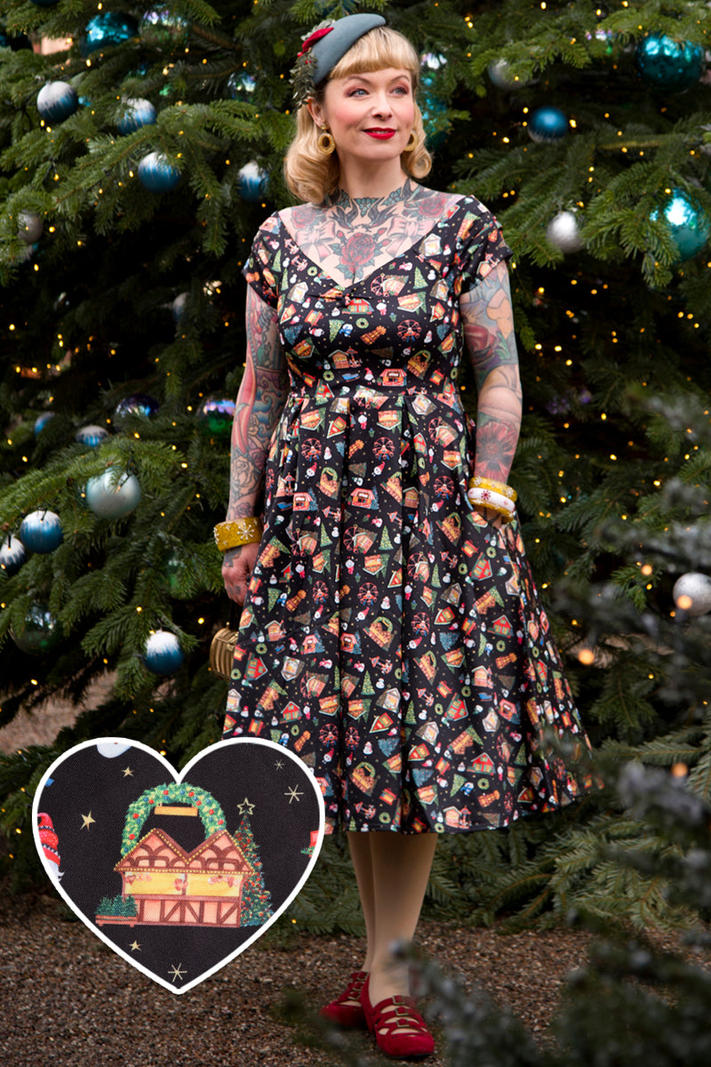 A model wearing Christmas Fair Off Shoulder Dress