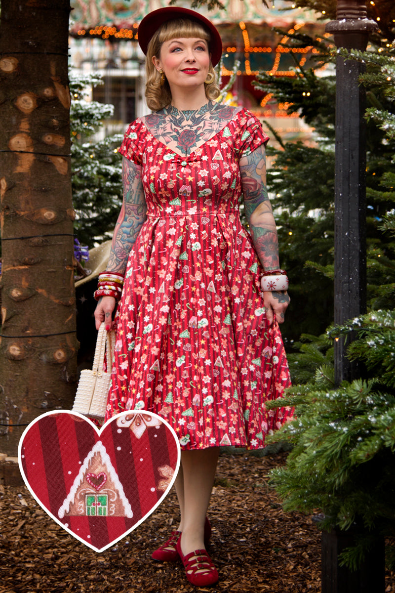 A lady wearing a Christmas Gingerbread Cookie Off Shoulder Dress