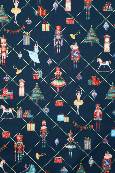 Close up view of Christmas Nutcrackers Midi Dress In Navy Blue