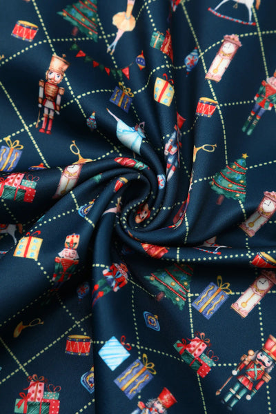 Close up view of Christmas Nutcrackers Midi Dress In Navy Blue