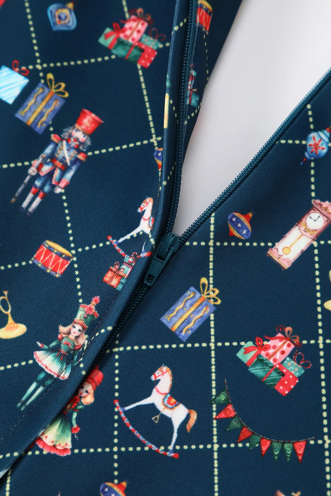 Close up view of Christmas Nutcrackers Midi Dress In Navy Blue