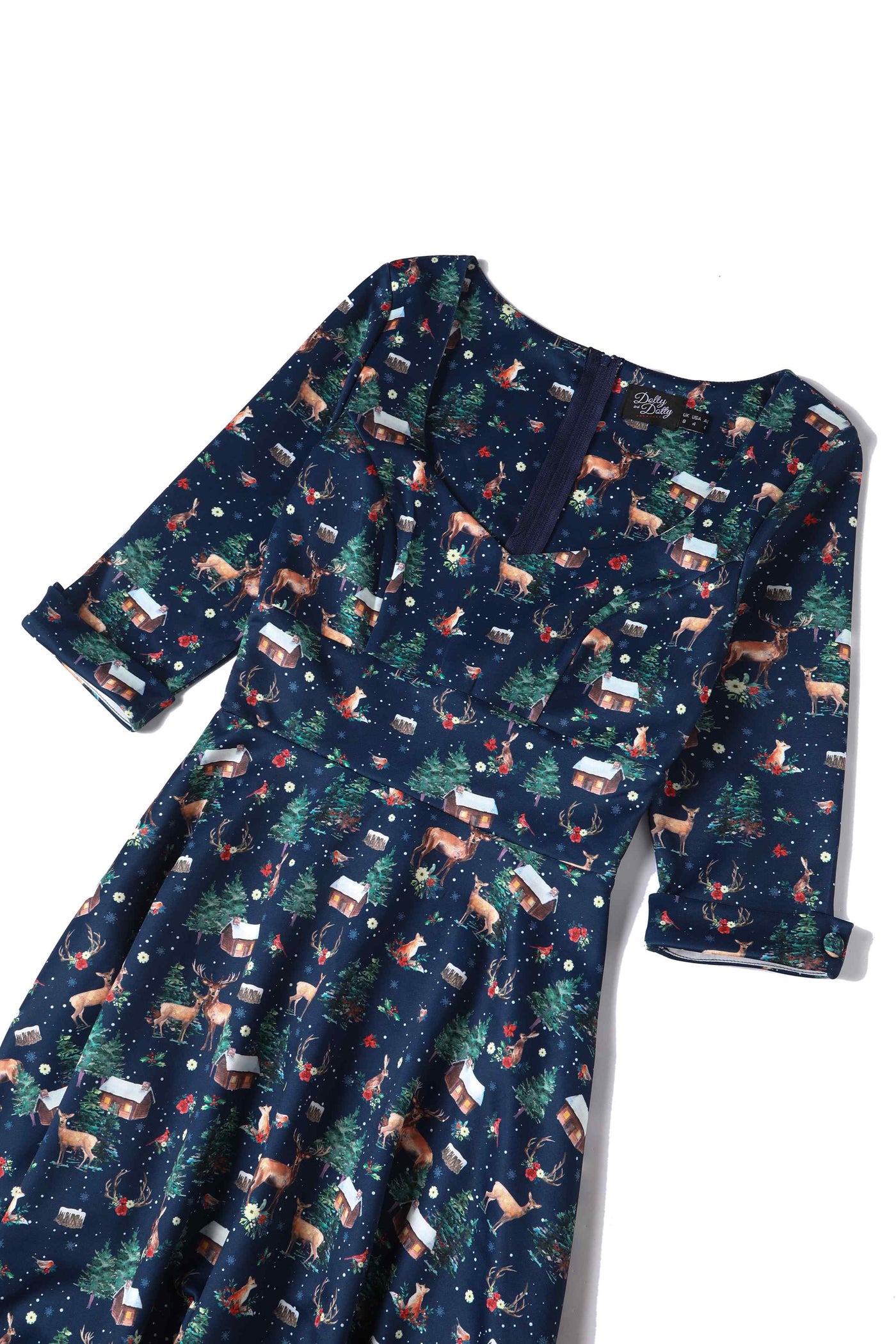 Close up view of Christmas Reindeer Midi Dress On Navy Blue