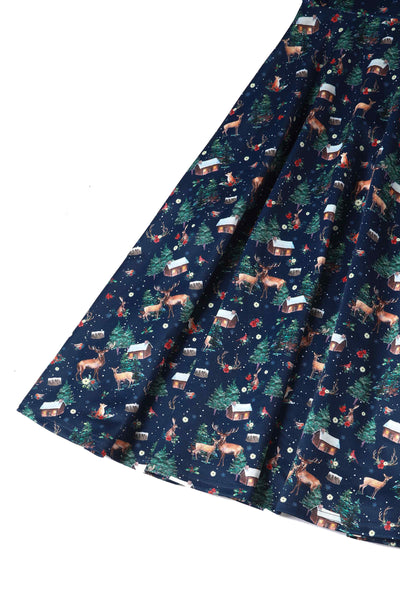 Close up view of Christmas Reindeer Midi Dress On Navy Blue