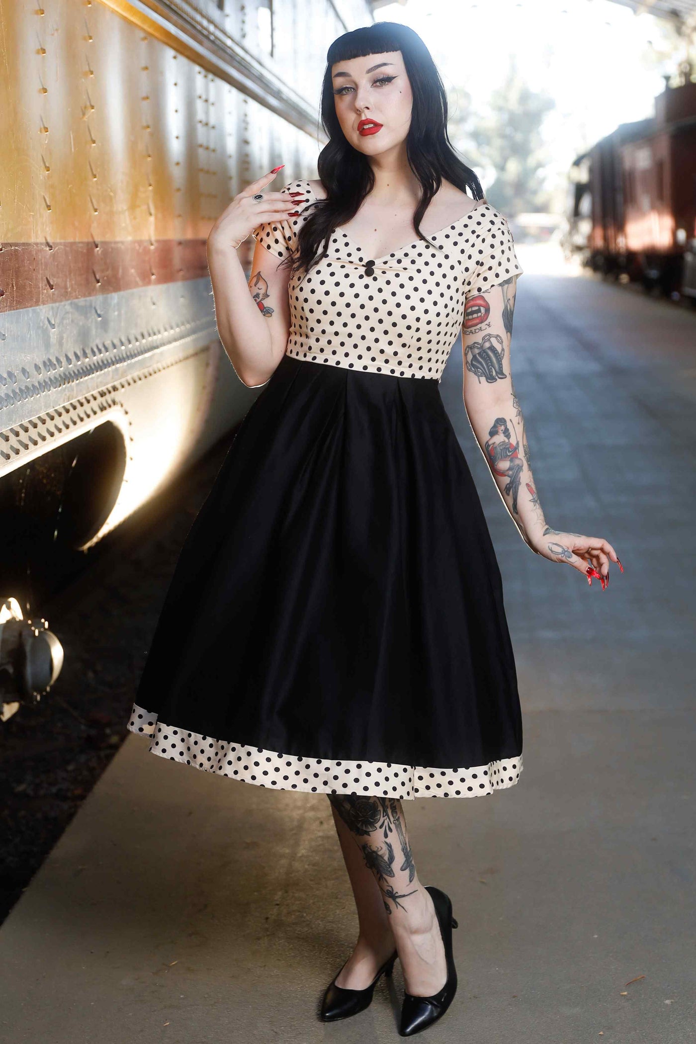 Front view of model wearing Cream & Black Polka Dot 50s Swing Dress